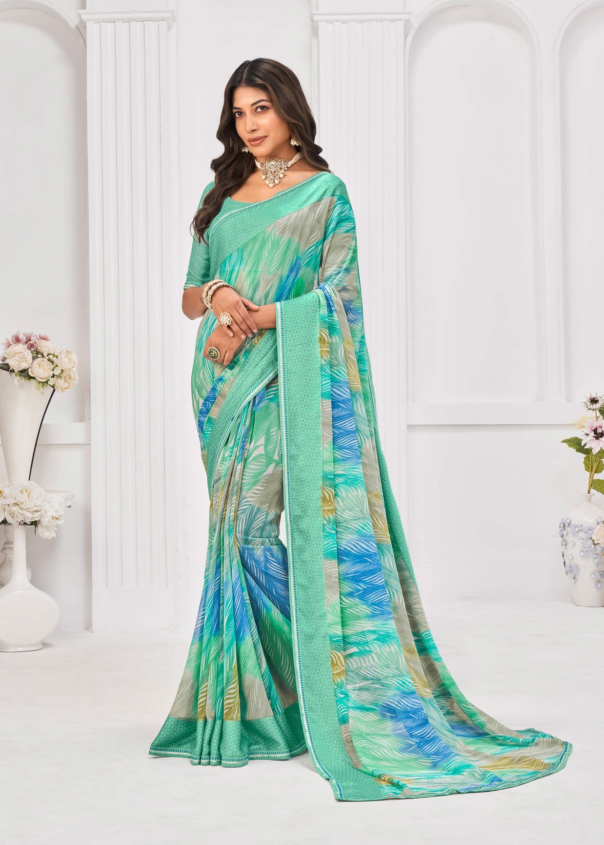 Laxmipati Sitaphal Geometric Printed Georgette Saree in Teal Green Color with Unstitched Blouse