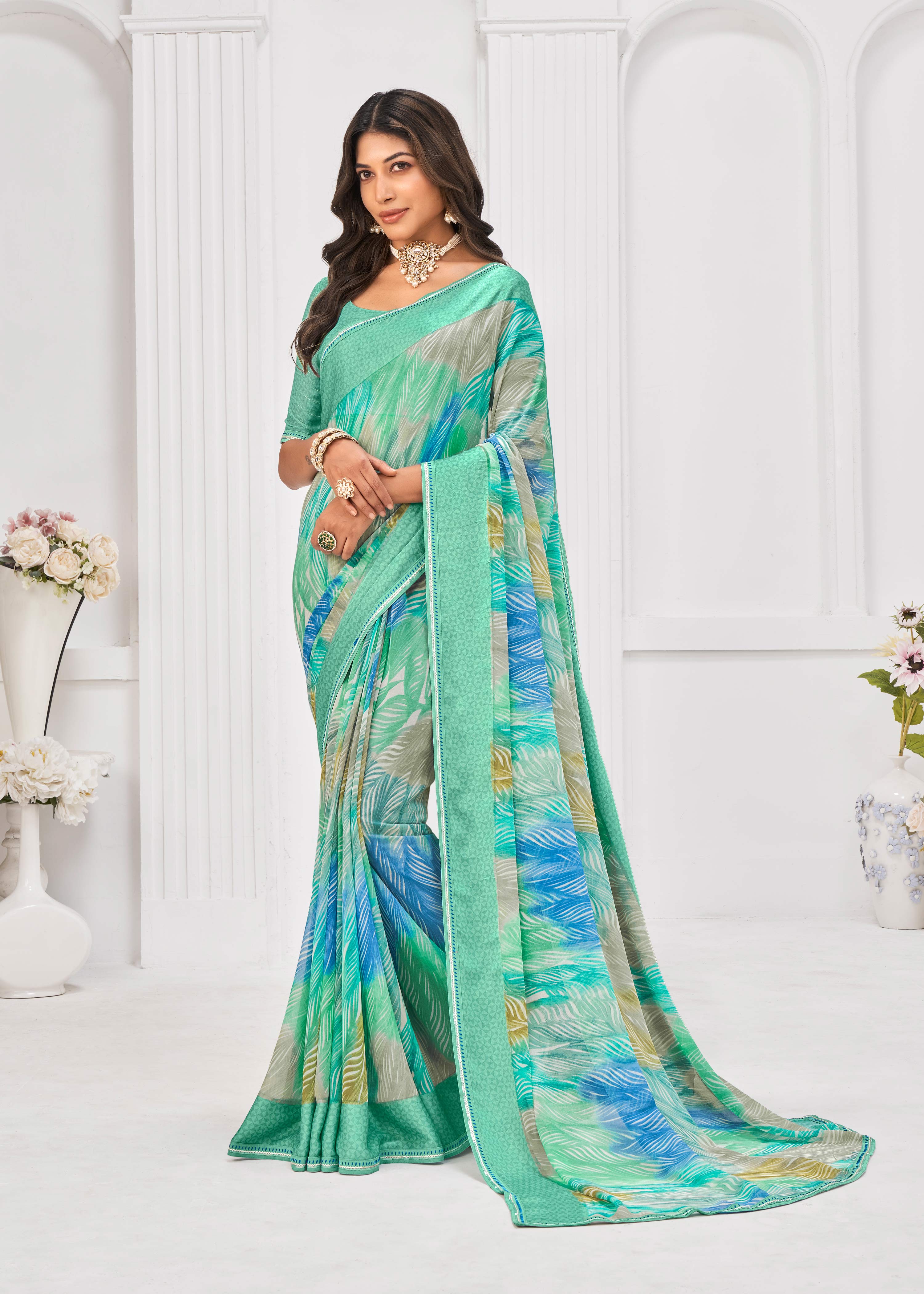 Laxmipati Sitaphal Geometric Printed Georgette Saree in Teal Green Color with Unstitched Blouse