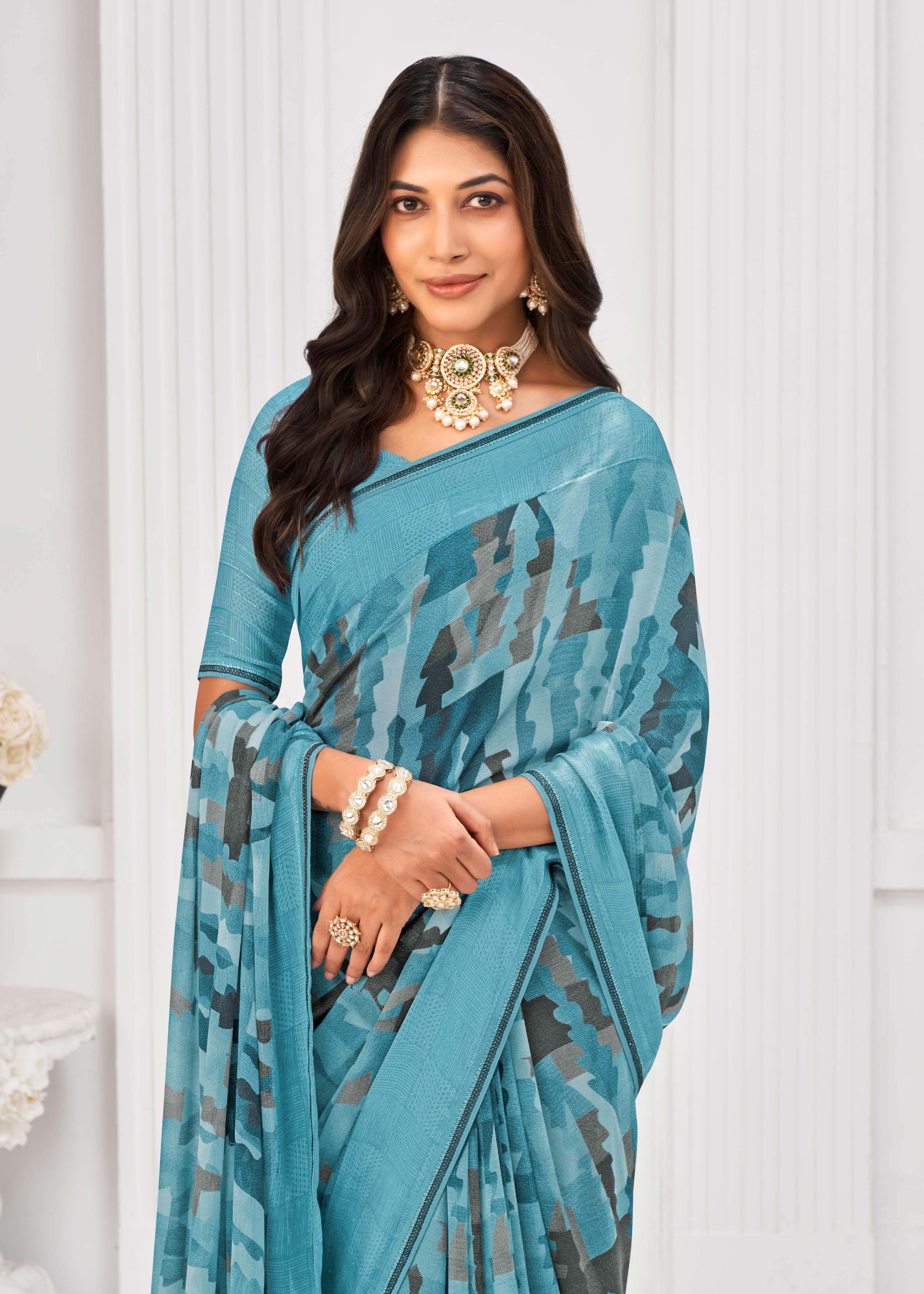 Laxmipati Sitaphal Geometric Printed Georgette Saree in Blue Color with Unstitched Blouse