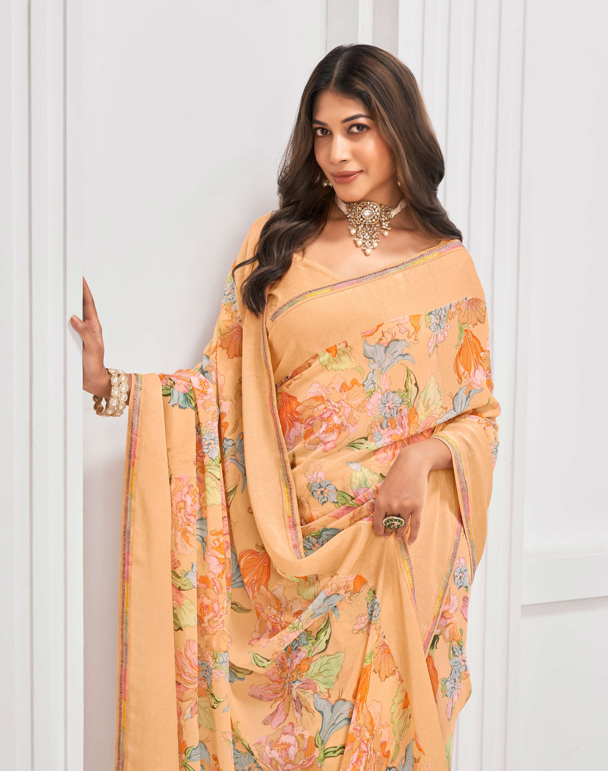 Laxmipati Sitaphal Floral Printed Georgette Saree in Peach Color with Unstitched Blouse