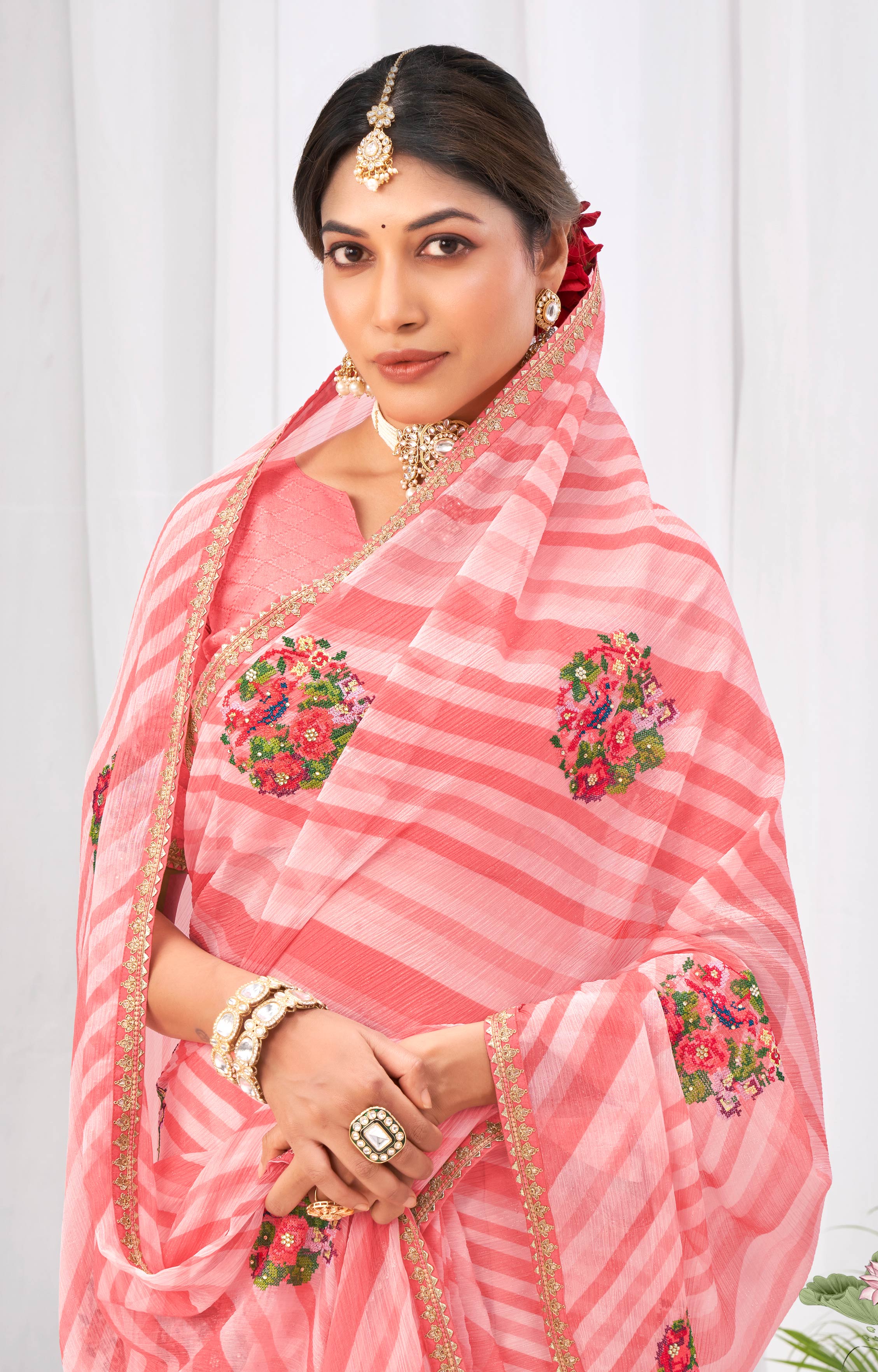Laxmipati Neha Leheriya Printed along with Floral Embroidered Chiffon Saree in Peach Color