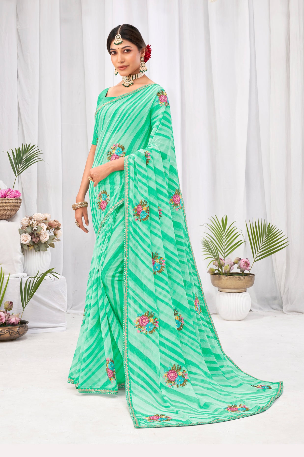 Laxmipati Neha Leheriya Printed along with Floral Embroidered Chiffon Saree in Green Color