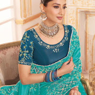 Laxmipati Chakor Teal Blue Tissue Organza Saree with Floral Embroidery