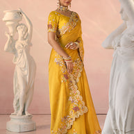 Laxmipati Kesaar Bhog Tissue Organza Floral Embroidered Saree in Mustard Color