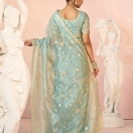 Laxmipati Kesaar Bhog Tissue Organza Floral Embroidered Saree in Pastel Blue Color