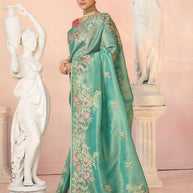 Laxmipati Kesaar Bhog Tissue Organza Floral Embroidered Saree in Teal Green Color