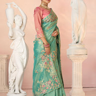 Laxmipati Kesaar Bhog Tissue Organza Floral Embroidered Saree in Teal Green Color