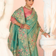 Laxmipati Kesaar Bhog Tissue Organza Floral Embroidered Saree in Teal Green Color