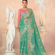 Laxmipati Kesaar Bhog Tissue Organza Floral Embroidered Saree in Teal Green Color