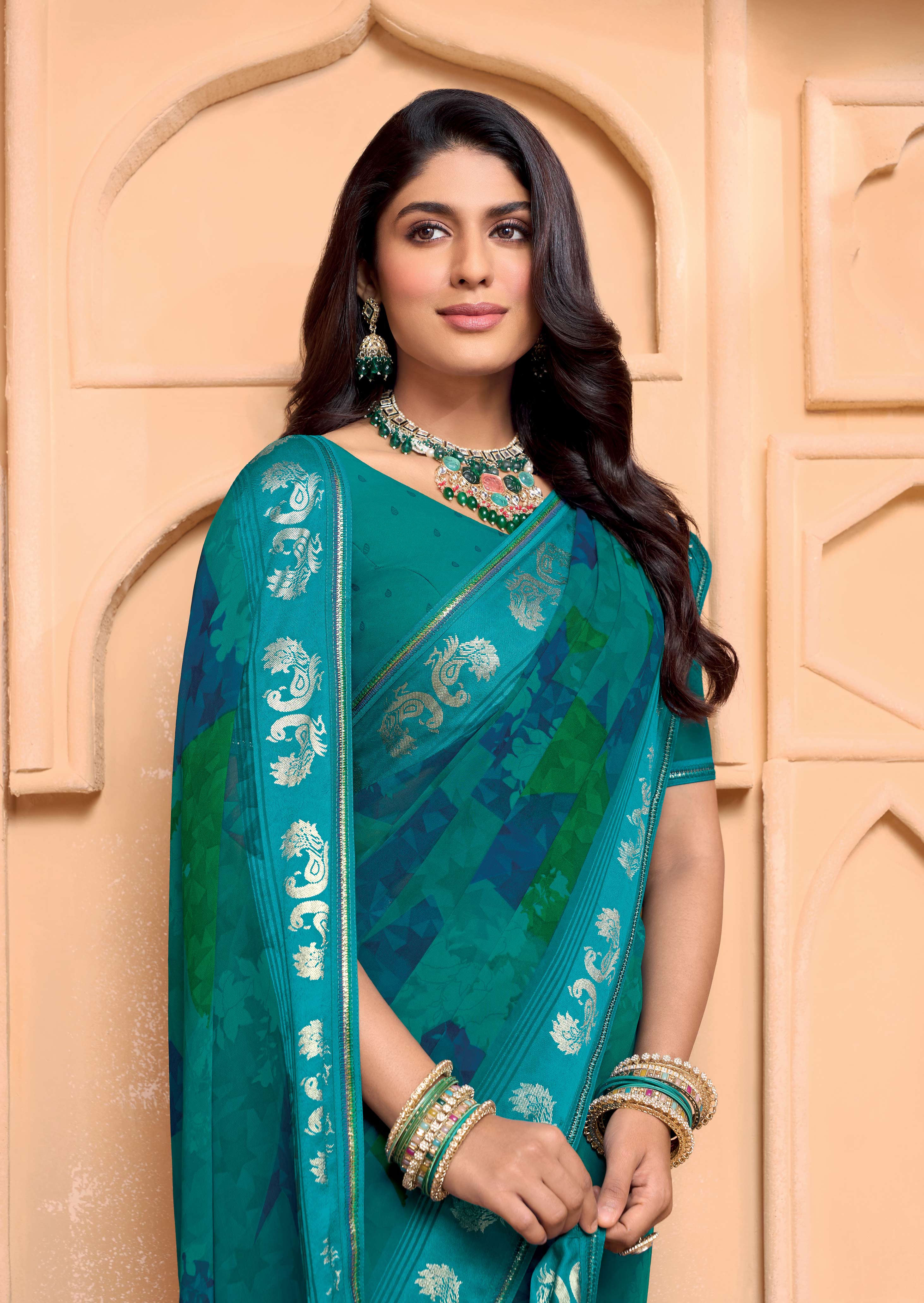Laxmipati Tohfa Abstract Printed Georgette Saree in Teal Blue Color
