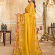 Mustard saree with pink silk blouse