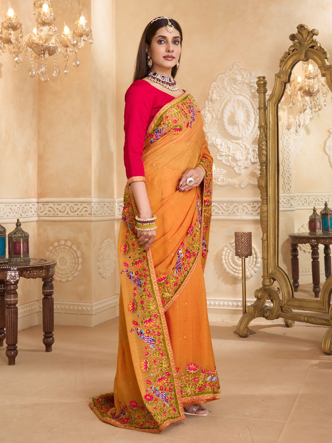 Orange saree with red printed blouse