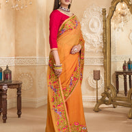 Orange saree with red printed blouse