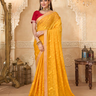 Mustard chiffon saree with floral work