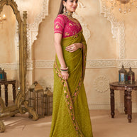 Olive green saree with pink blouse