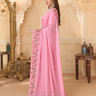 Pink saree with printed silk blouse