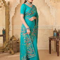 Teal blue saree with printed blouse