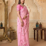 Pink saree with purple silk blouse