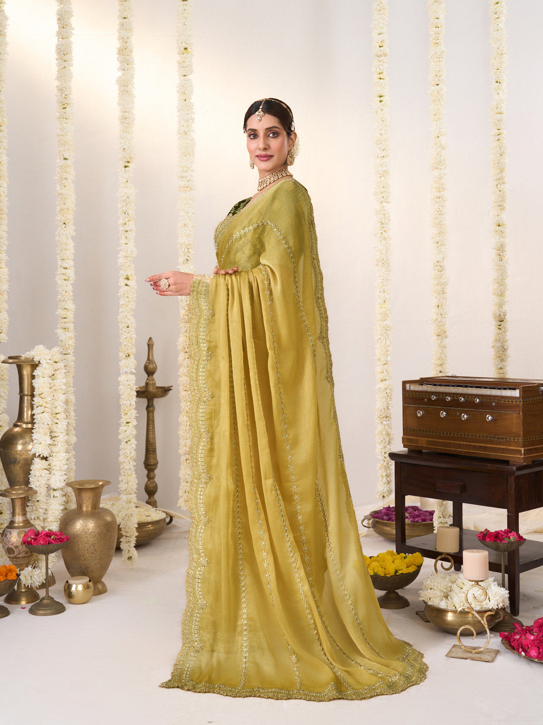 Yellow saree with green blouse