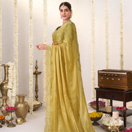 Yellow saree with green blouse