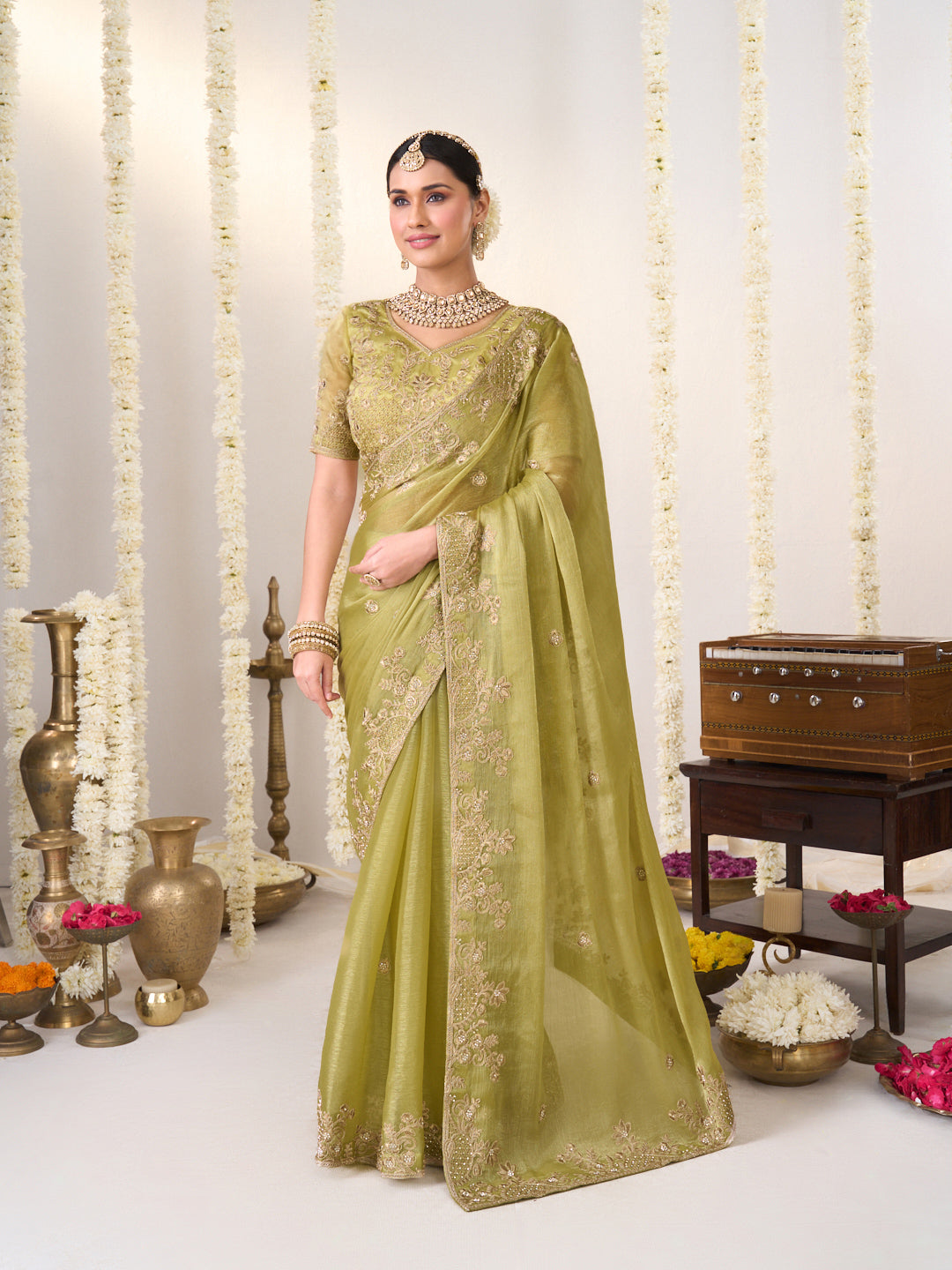 green embroidered chiffon saree