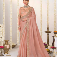 Peach embroidered chiffon saree