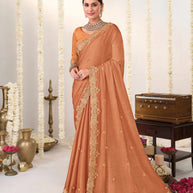 Orange embroidered chiffon saree