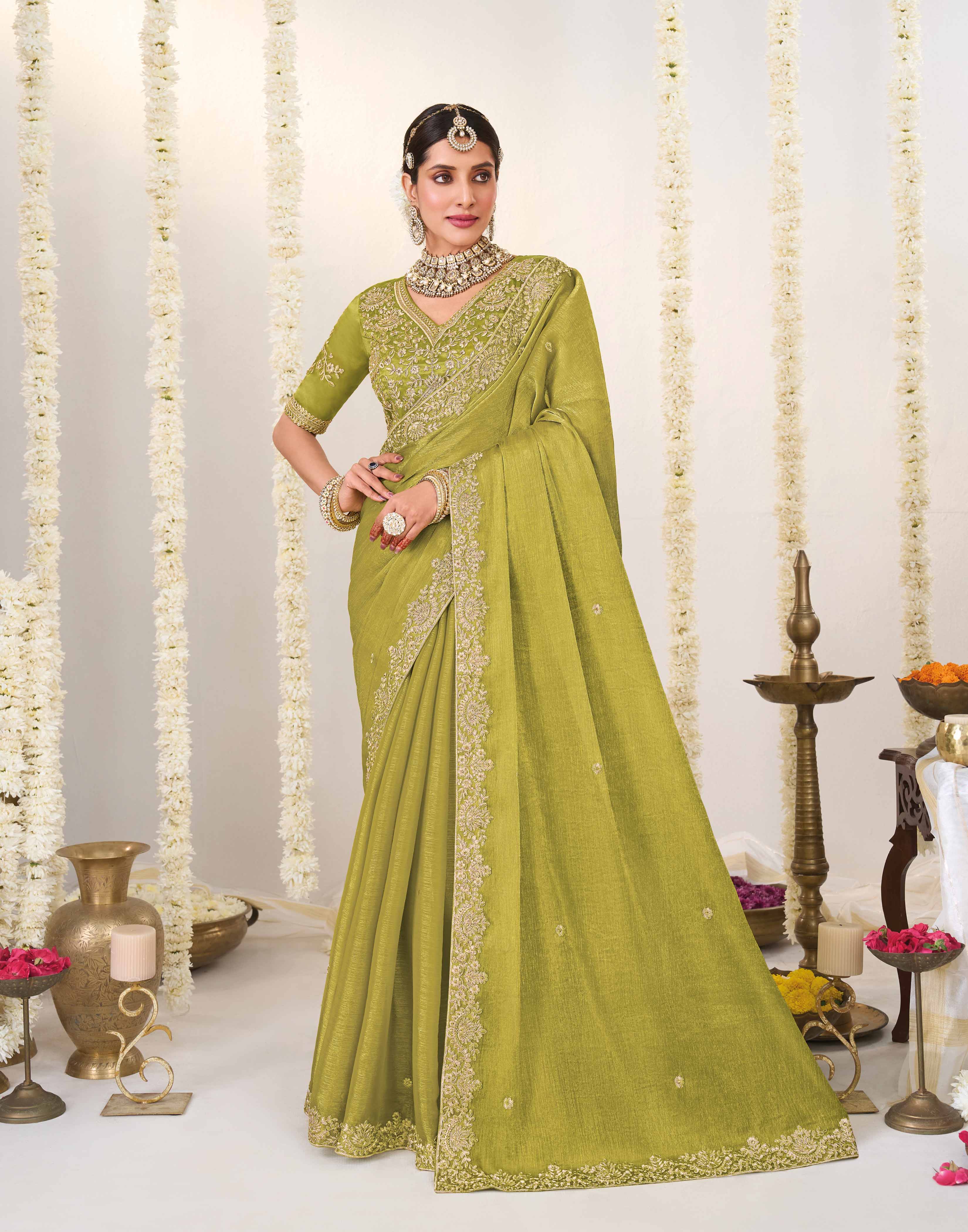 Olive green embroidered chiffon saree