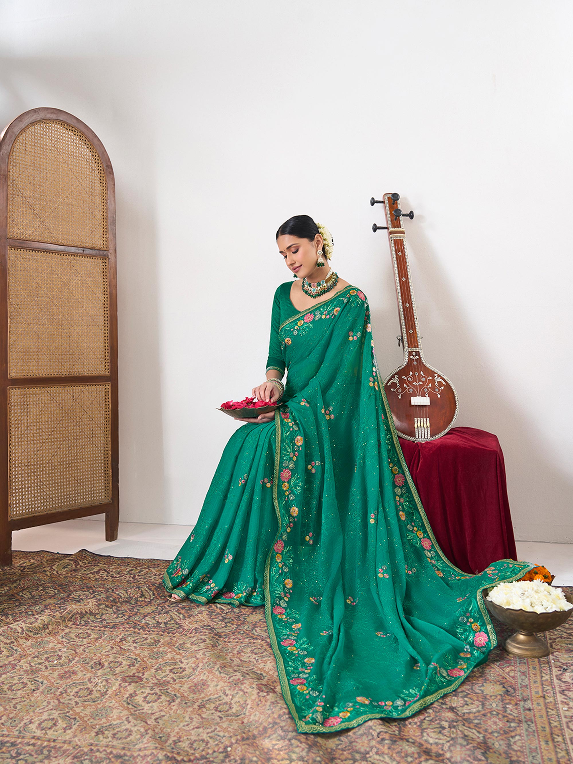 Green embroidered chiffon saree