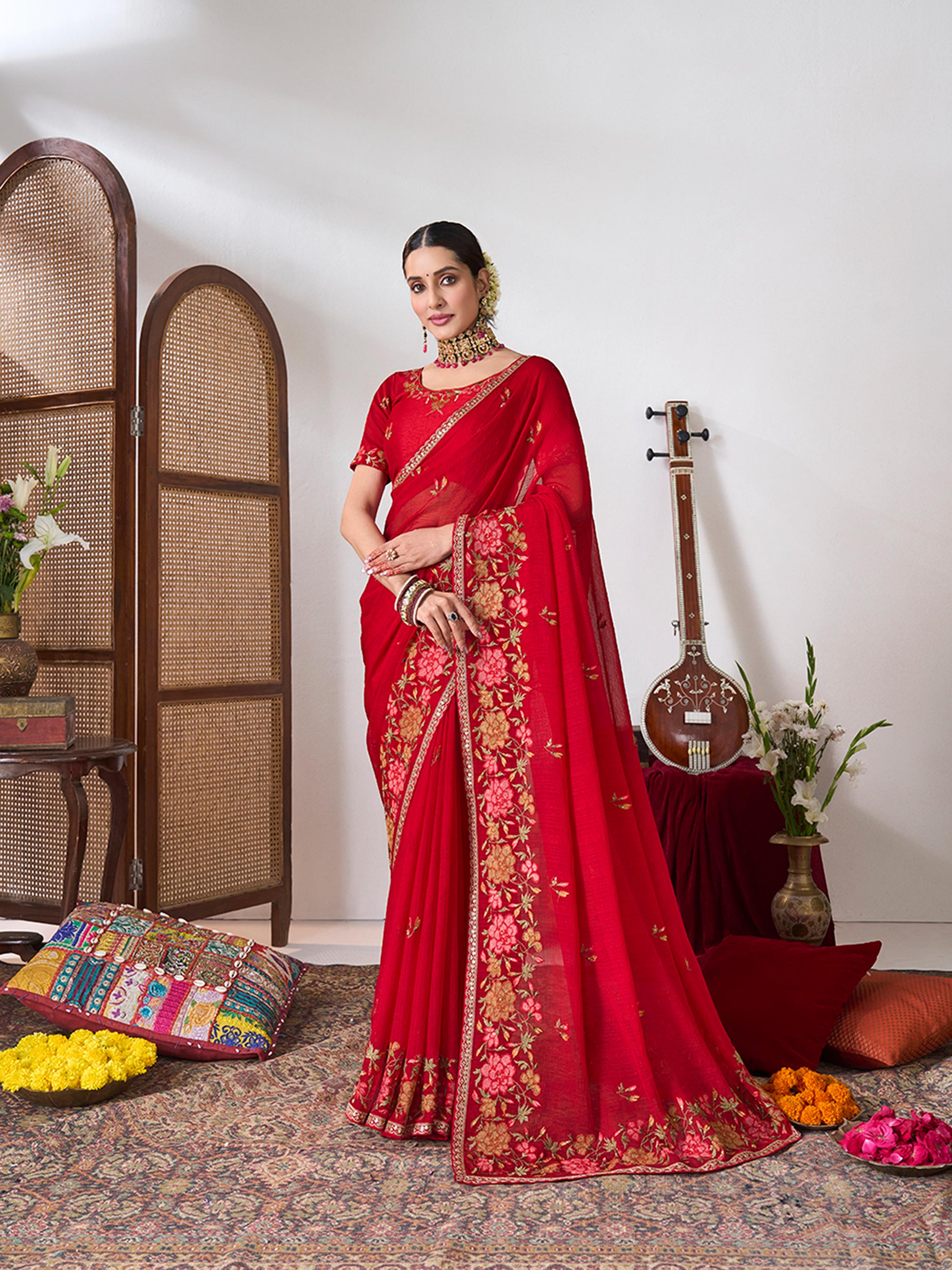 Red embroidered chiffon saree