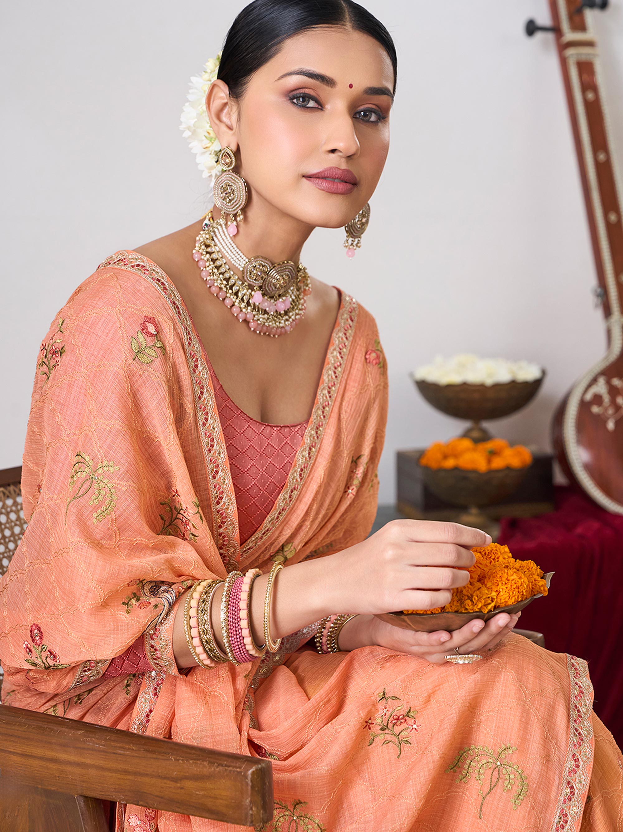 Peach embroidered chiffon saree
