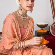 Peach embroidered chiffon saree