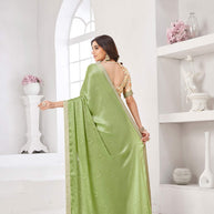 Mint green printed saree with cream blouse