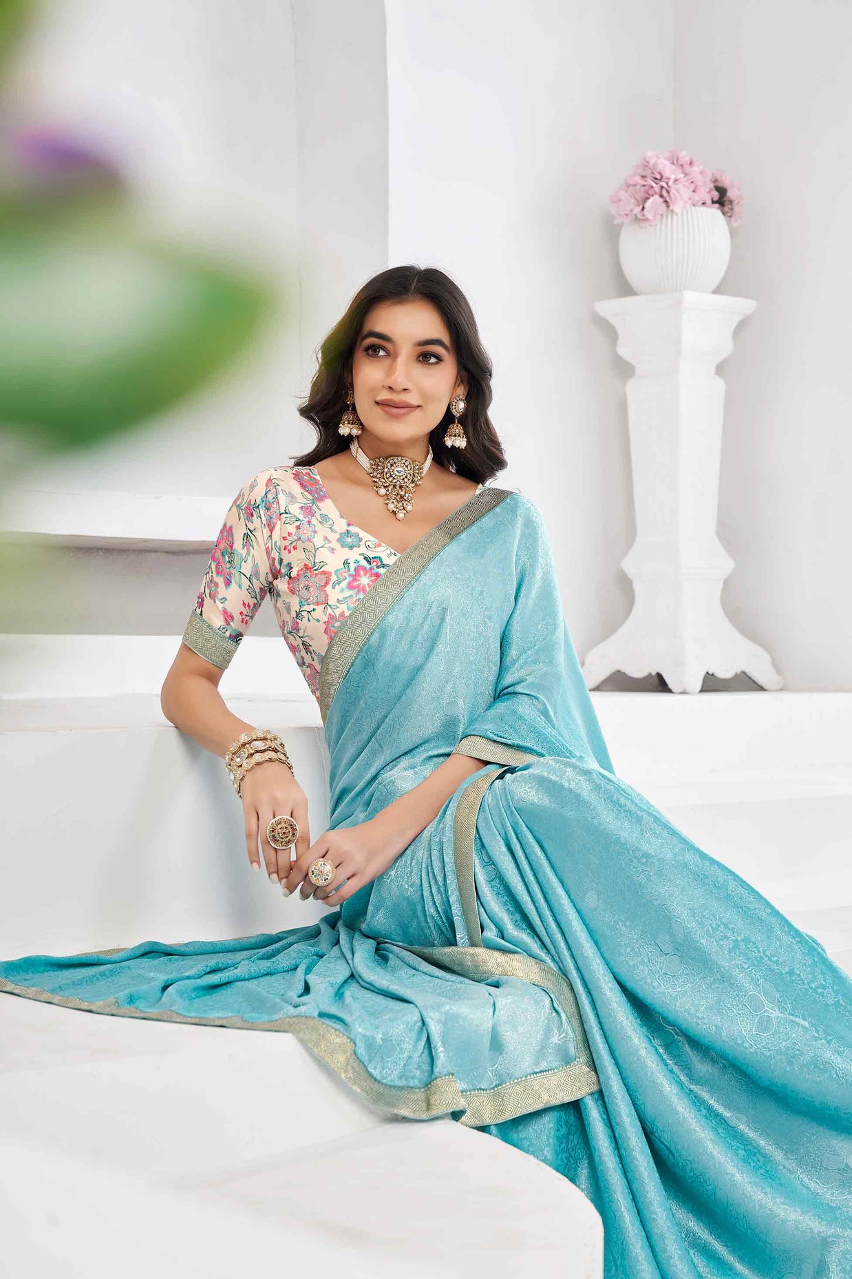 Teal blue floral print saree