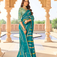 Teal blue ethnic print chiffon saree