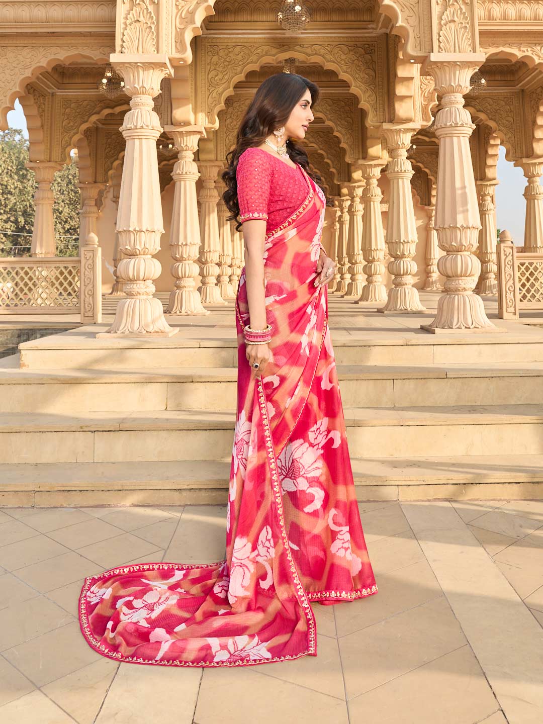 Pink chiffon saree with embroidered blouse