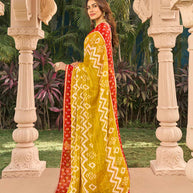 Mustard chiffon saree with red blouse