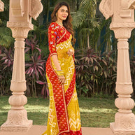  Ikkat pattern detail on mustard saree