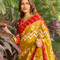 Laxmipati Nakhrali Mustard Chiffon Chevron Printed Saree