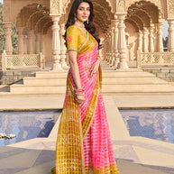 Floral print detail on pink chiffon saree