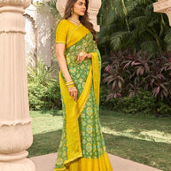 Floral pattern on green chiffon saree
