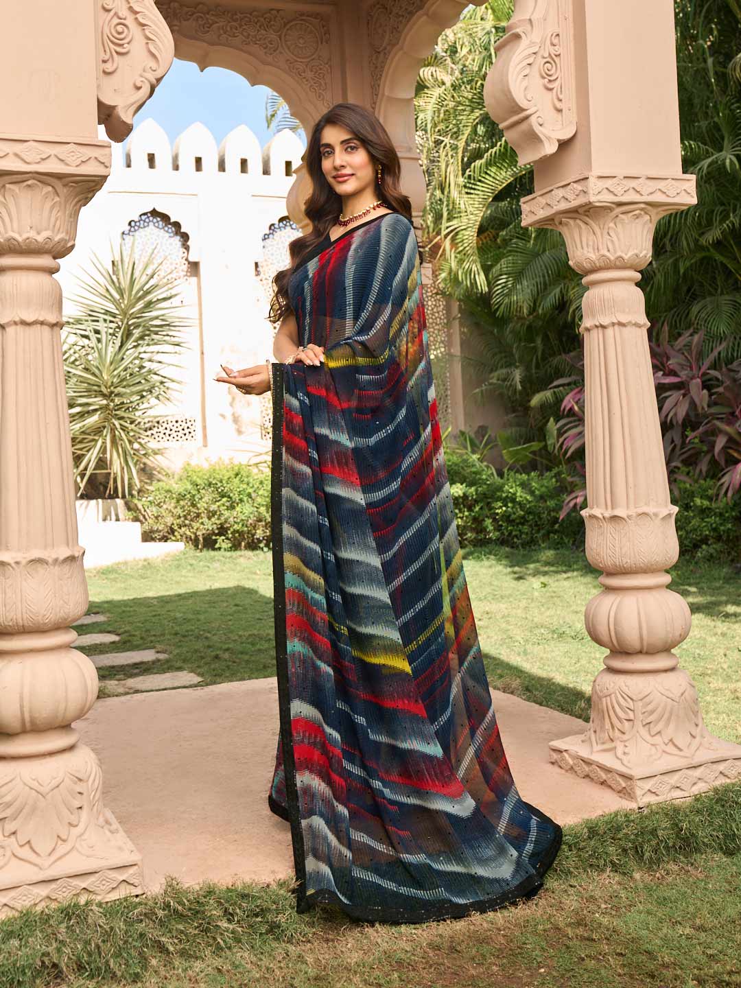 Stripe pattern on black georgette saree