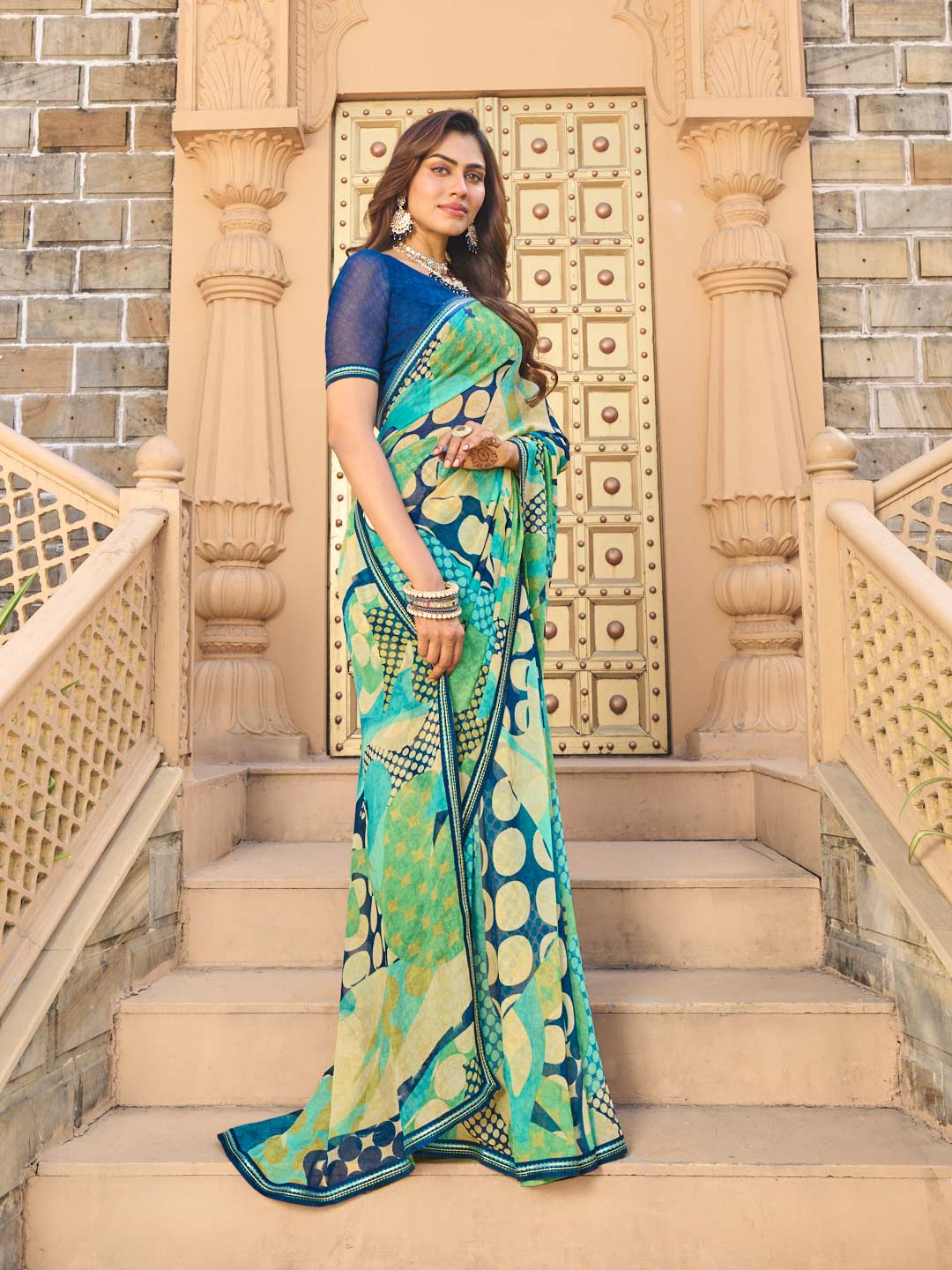  Teal blue georgette saree with navy blouse