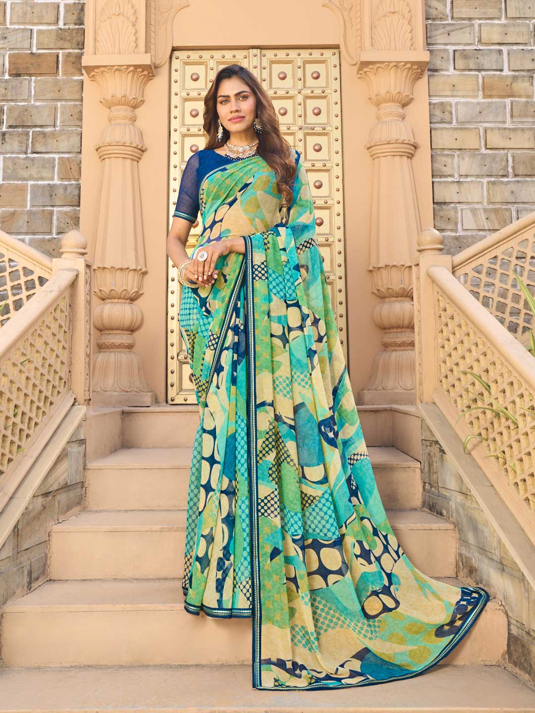 Teal blue geometric print georgette saree