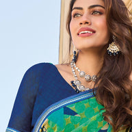 Printed teal georgette saree styling