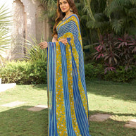 Navy blue georgette saree with mustard blouse