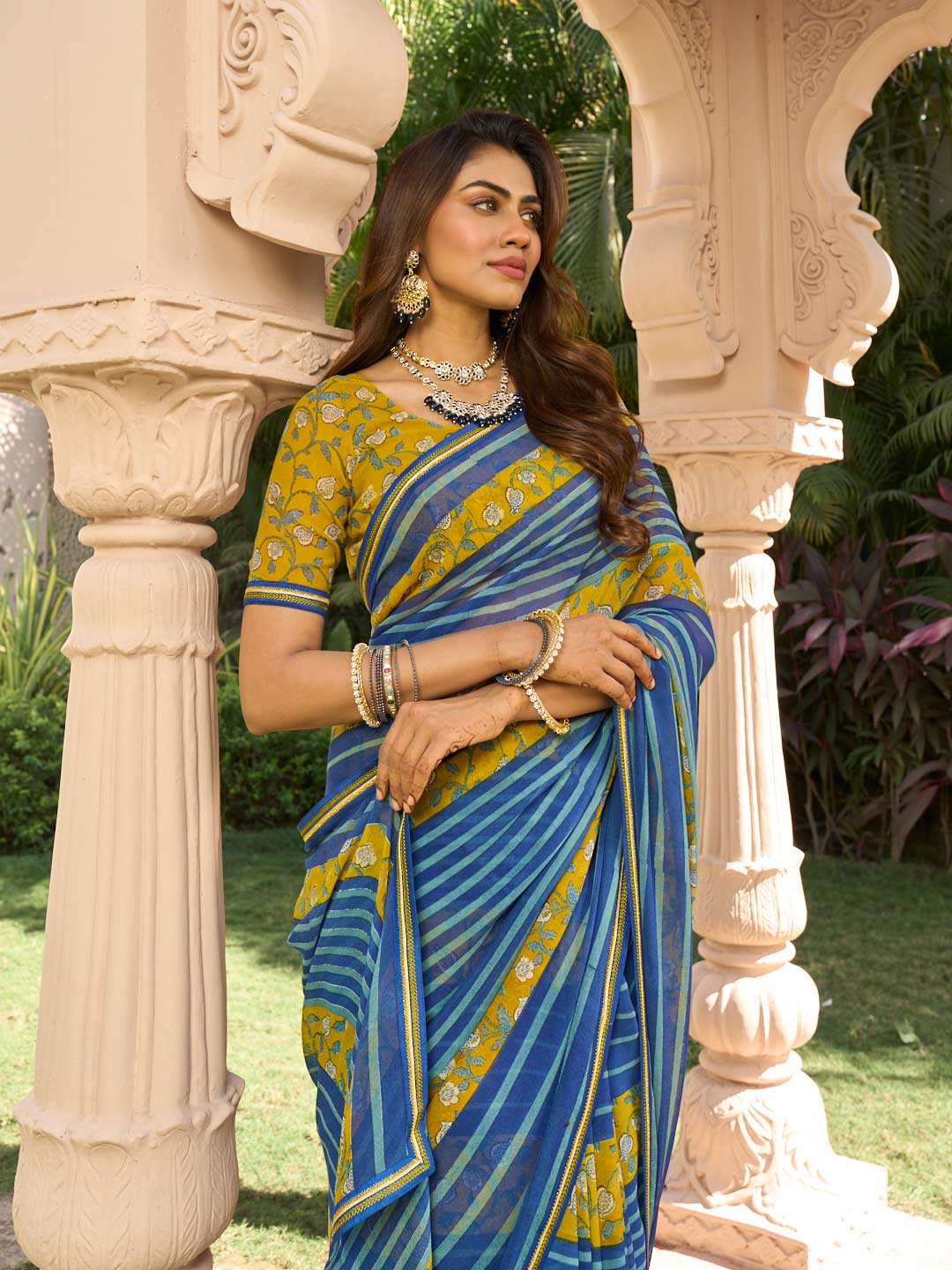 Stripe pattern on navy blue georgette saree