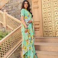 Teal green silk saree with matching blouse