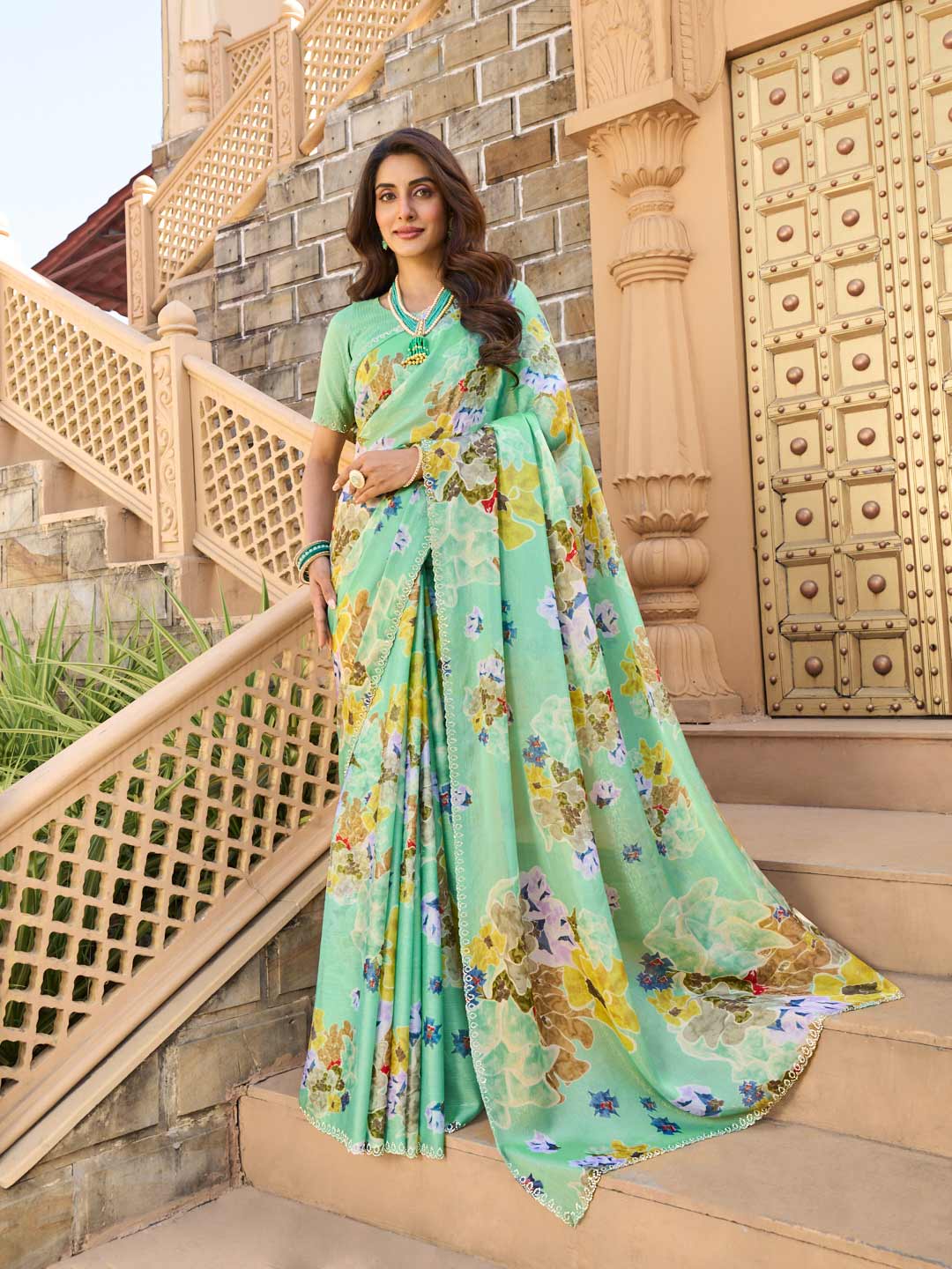 Teal green floral print silk saree