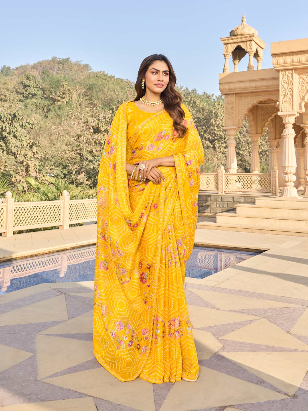 Yellow chiffon saree with matching blouse